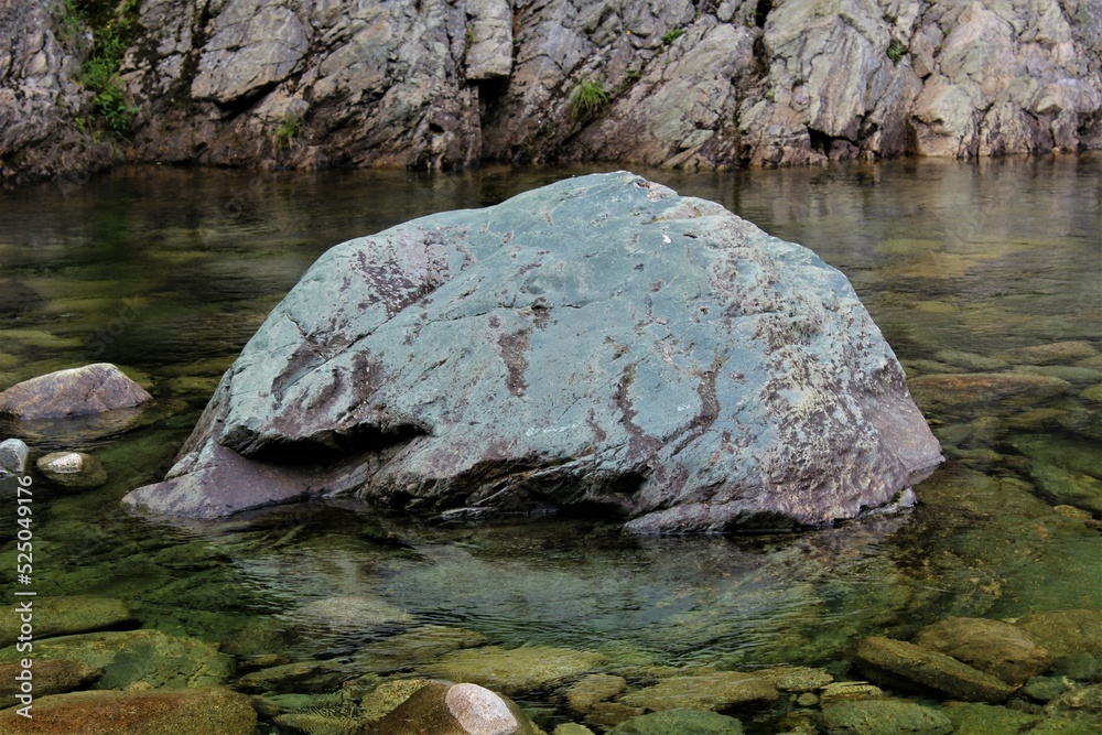 Fototapeta premium Gorgeous blue rock seen in Upper Salmon River, Fundy National Park, New Brunswick, Canada. Stunning and calm nature background. Concept for serene wilderness