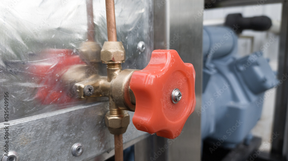 valve opening and closing the refrigerant line on the air conditioning pipe Stock Photo Adobe
