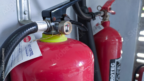 Fire extinguisher or what is called an APAR is a tool to extinguish a fire when a fire occurs, in the form of a tube containing powder as an extinguishing medium. photo