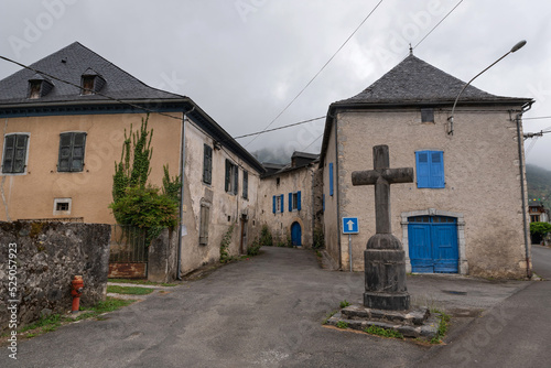 Houses and cross in Bielle. Atlantic Pyrenees