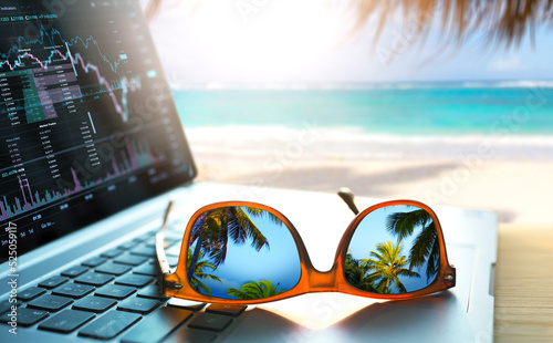 Fototapeta Naklejka Na Ścianę i Meble -  Art remote work in a tropical sea beach. Dream work office background