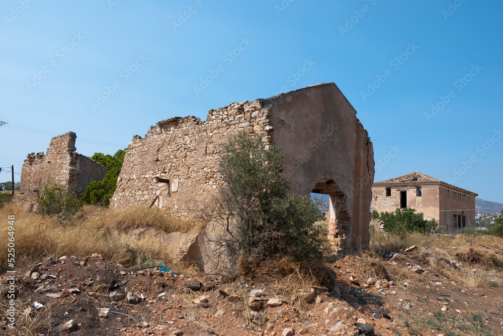 Athens, Greece / July 2022: Wine making facility ruins dating to 1875.