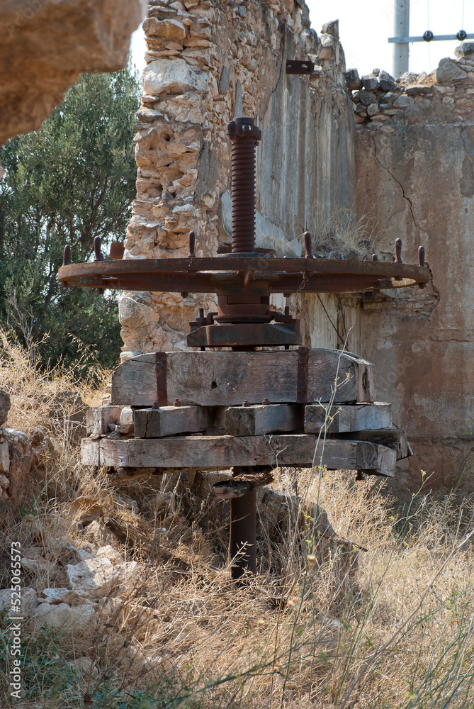 Athens, Greece / July 2022: Wine making facility ruins dating to 1875. Old wine press