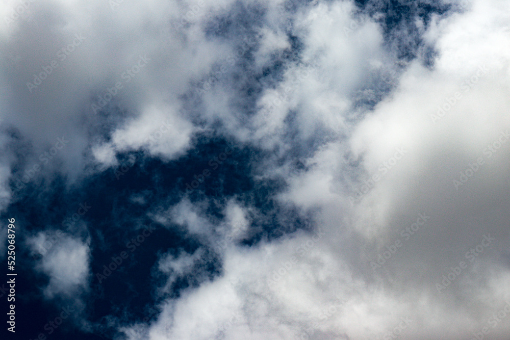 large isolated clouds in a blue sky 