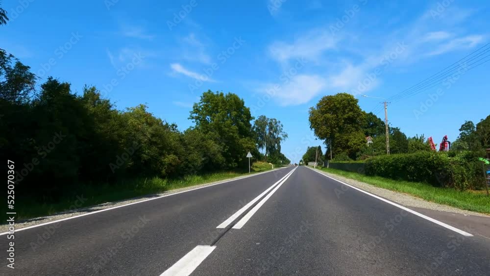 Beautiful nature of Poland. The car is driving on the road to Poland. Interior view Elblag, POLAND, august 2022 Beautiful nature of Poland. The car is driving on the road to Poland. Interior view Elblag, POLAND, august 2022