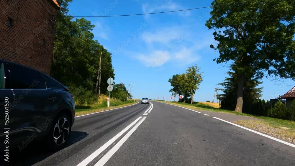 Beautiful nature of Poland. The car is driving on the road to Poland. Interior view Elblag, POLAND, august 2022 Beautiful nature of Poland. The car is driving on the road to Poland. Interior view Elblag, POLAND, august 2022
