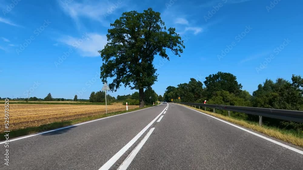 Beautiful nature of Poland. The car is driving on the road to Poland. Interior view Elblag, POLAND, august 2022 Beautiful nature of Poland. The car is driving on the road to Poland. Interior view Elblag, POLAND, august 2022