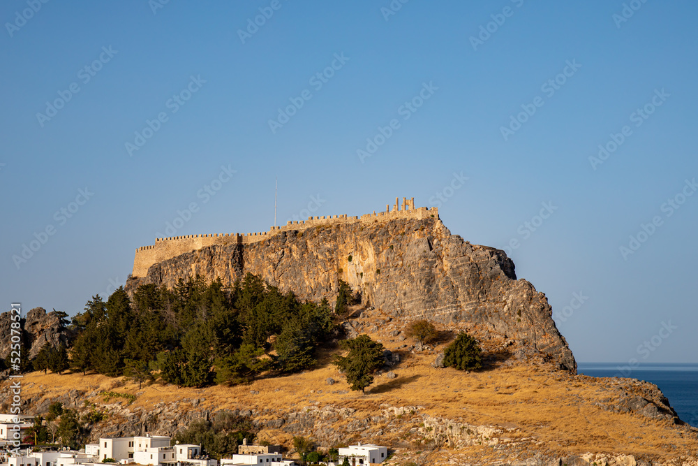 Lindos town on Rhodes island, Greece, at sunset