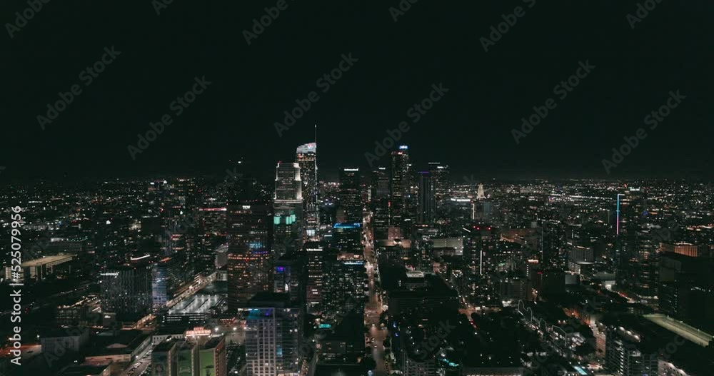 Wide view of downtown LA at night from a top a skyscraper Wide view of downtown LA at night from a top a skyscraper