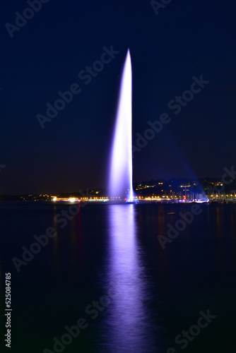 Switzerland, Geneva. Night view of the Jet d'Eau (Water-Jet) on Lake Geneva. August 15, 2022.