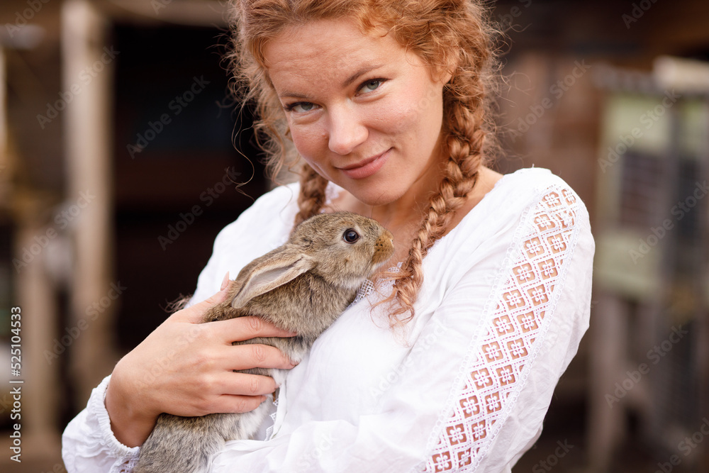 portrait of a girl with a rabbit close portrait of a girl with a rabbit close