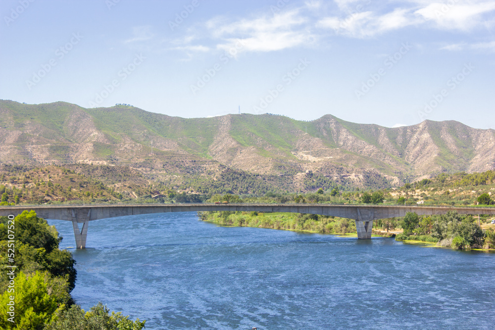 Bridge across the Ebro River, with the ebro river and the mountains in the background