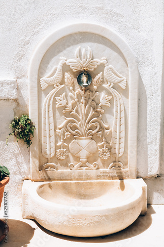 Details and streets of village of Pyrgos with Cycladic houses on Tinos island, Cyclades, Greece photo