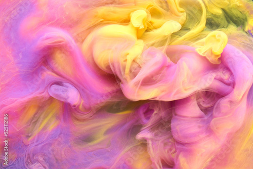 Multicolored yellow pink smoke abstract background, acrylic paint underwater explosion