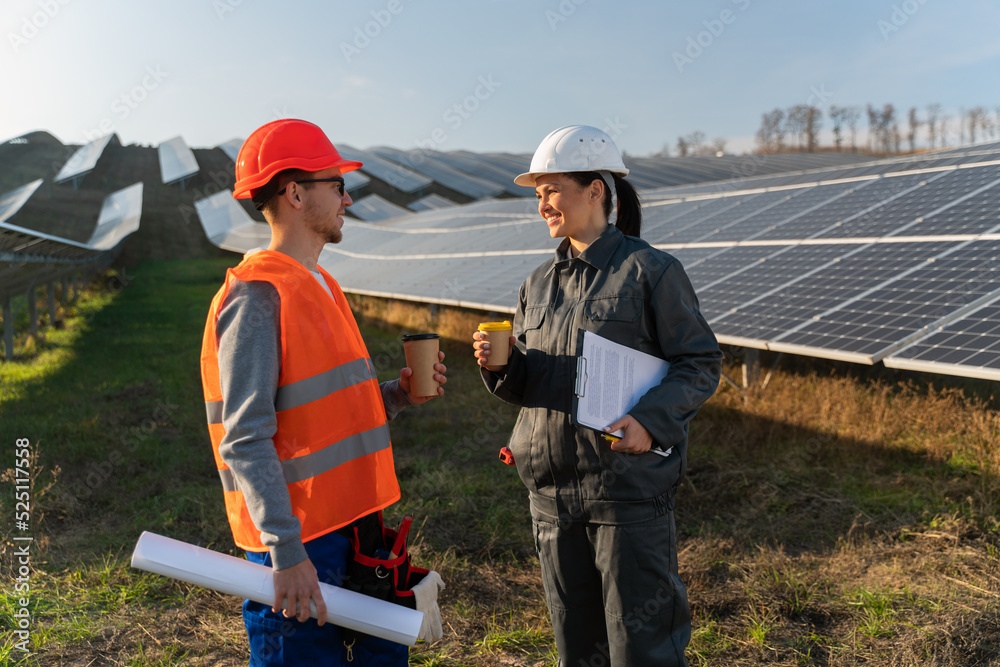 Business team of engineers discussing efficient plan of construction energy batteries Business team of engineers discussing efficient plan of construction energy batteries