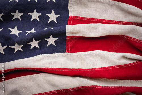 Rumpled vintage American flag background on a horizontal surface
