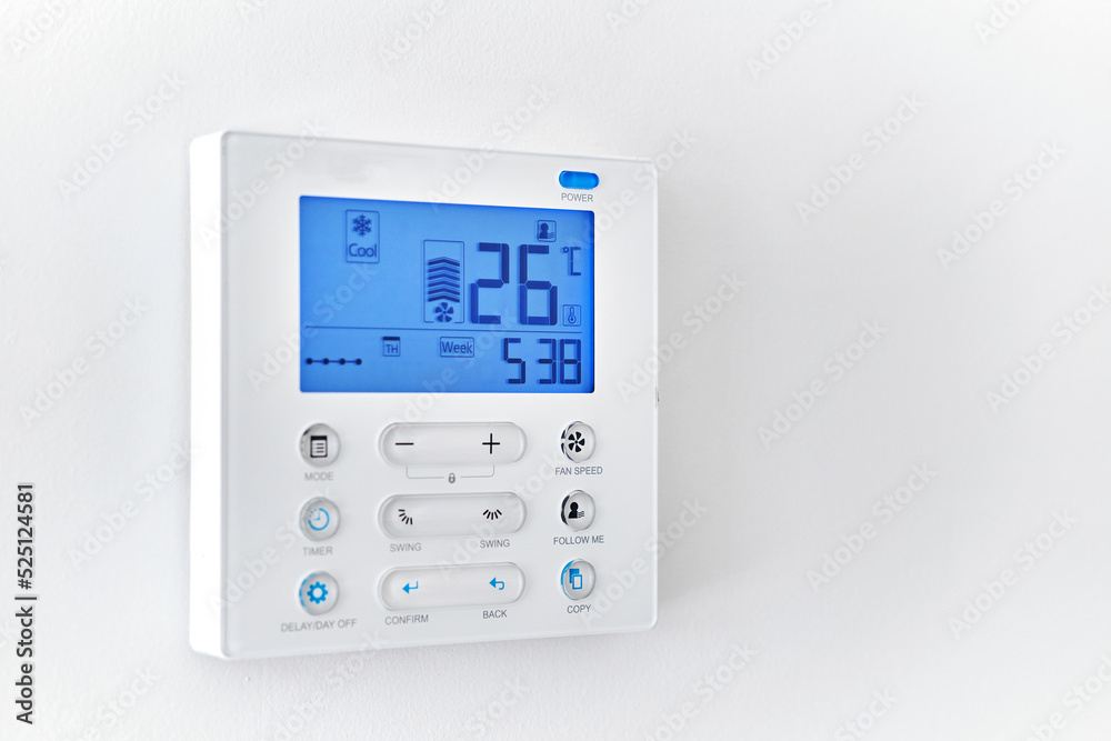 Close up climate control, remote air-conditioner inside smart home Close up climate control, remote air-conditioner inside smart home