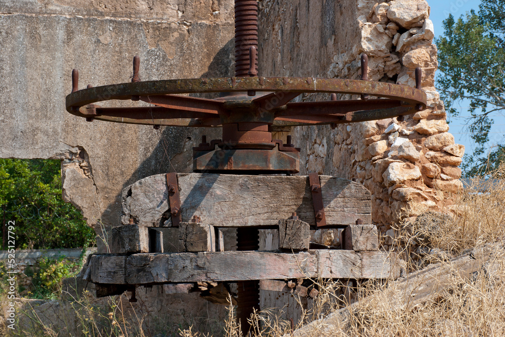 Athens, Greece / July 2022: Wine making facility ruins dating to 1875. Old wine press