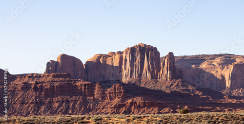 Desert Rocky Mountain American Landscape. Morning Sunny Sunrise Sky. Oljato-Monument Valley, Utah, United States. Nature Background