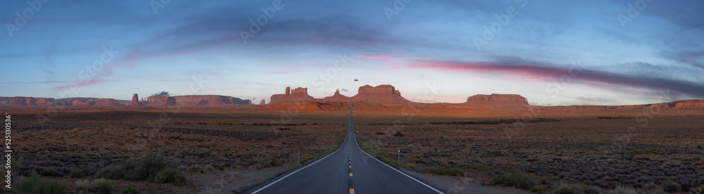 Scenic Road in the Dry Desert with Red Rocky Mountains in Background. Sunrise Sky Art Render. Forrest Gump Point in Oljato-Monument Valley, Utah, United States. Panorama