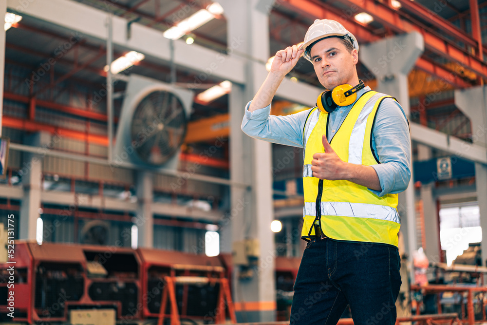 Portrait smart professional caucasian Industrial, factory engineer,technician,worker man stand confidence with safety helmet in steel metal sheet production, manufacture worker concept with copy space Portrait smart professional caucasian Industrial, factory engineer,technician,worker man stand confidence with safety helmet in steel metal sheet production, manufacture worker concept with copy space