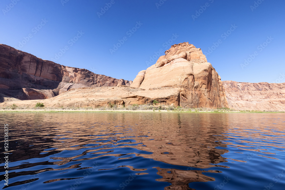 Colorado River in Glen Canyon, Arizona, United States of America. American Mountain Nature Landscape Background. Sunny Sunrise. Colorado River in Glen Canyon, Arizona, United States of America. American Mountain Nature Landscape Background. Sunny Sunrise.