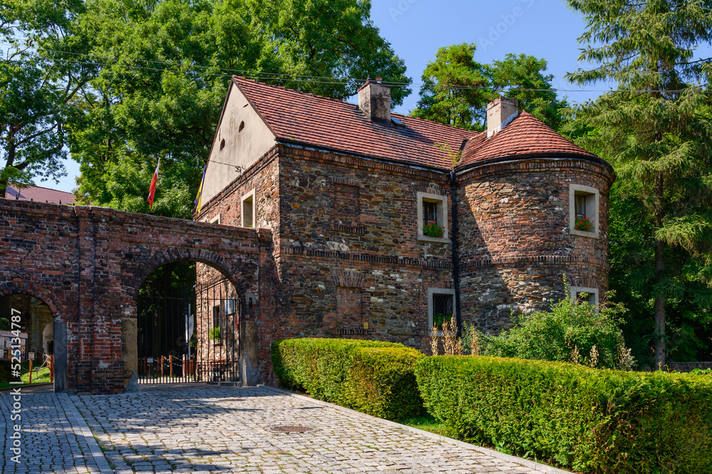 Castle in Toszek, a brick castle from the 15th century, partially reconstructed. View of the main entrance to the castle leading to the courtyard.