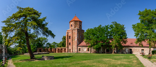 Castle in Toszek, a brick castle from the 15th century, partially reconstructed. View from the green courtyard to the building.