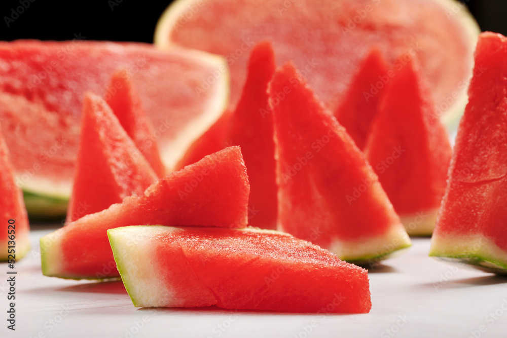 Watermelon slices on a white background.