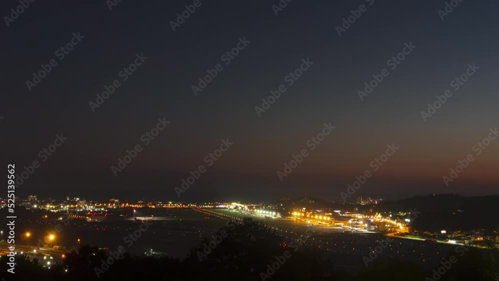 Sochi airport at night, timelapse. Night lights in urban infrastructure. Tourism and travel concept Sochi airport at night, timelapse. Night lights in urban infrastructure. Tourism and travel concept