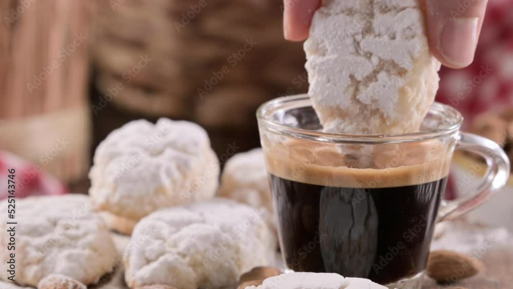 Sicilian Almond Cookies - Almond Pastes. Traditional dessert of the South of Italy and a cup of fragrant espresso on a wooden table. The atmosphere of an Italian village. 4k video