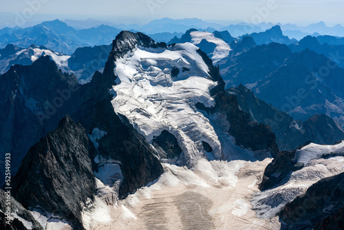 Glacier Blanc im Sommer bei Gletscherschmelze mit Sahara Sand als Luftbild photo