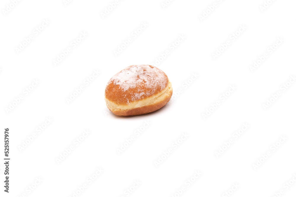A delicious berliner (berliner donut), isolated on white background. A Berliner is a German donut with no center hole, made of sweet yeast dough fried in fat or oil, with a jam or marmalade filling . A delicious berliner (berliner donut), isolated on white background. A Berliner is a German donut with no center hole, made of sweet yeast dough fried in fat or oil, with a jam or marmalade filling .