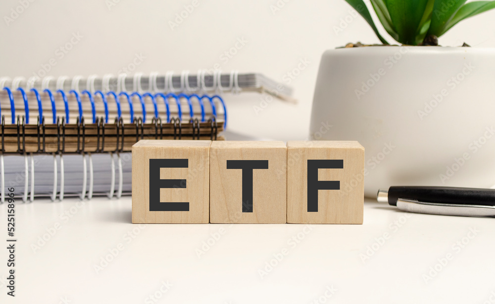 ETF word concept written on wooden blocks, cubes on a light table