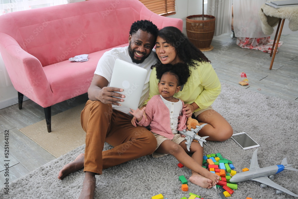 Joyful multiethnic family and their leisure at home