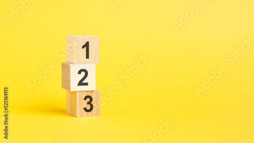 123 - text on wooden block with yellow backgrounds