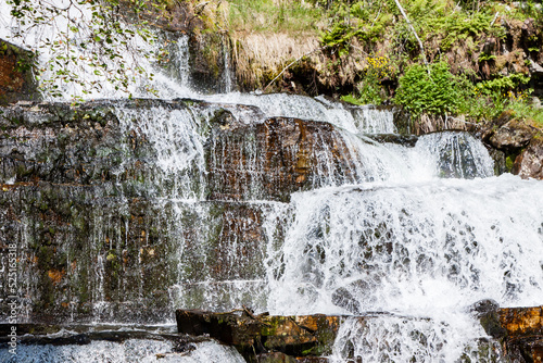 View of Tvindefossen or Tvinnefossen waterfall near Voss in Norway