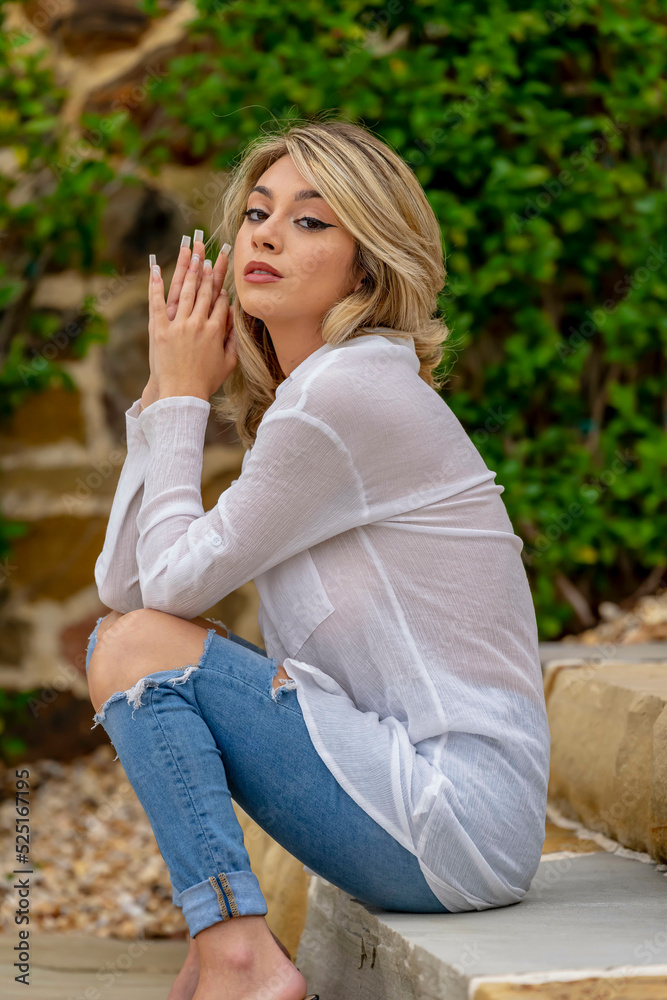 A Lovely Blonde Model Poses Outdoor While Enjoying The Spring Weather A Lovely Blonde Model Poses Outdoor While Enjoying The Spring Weather