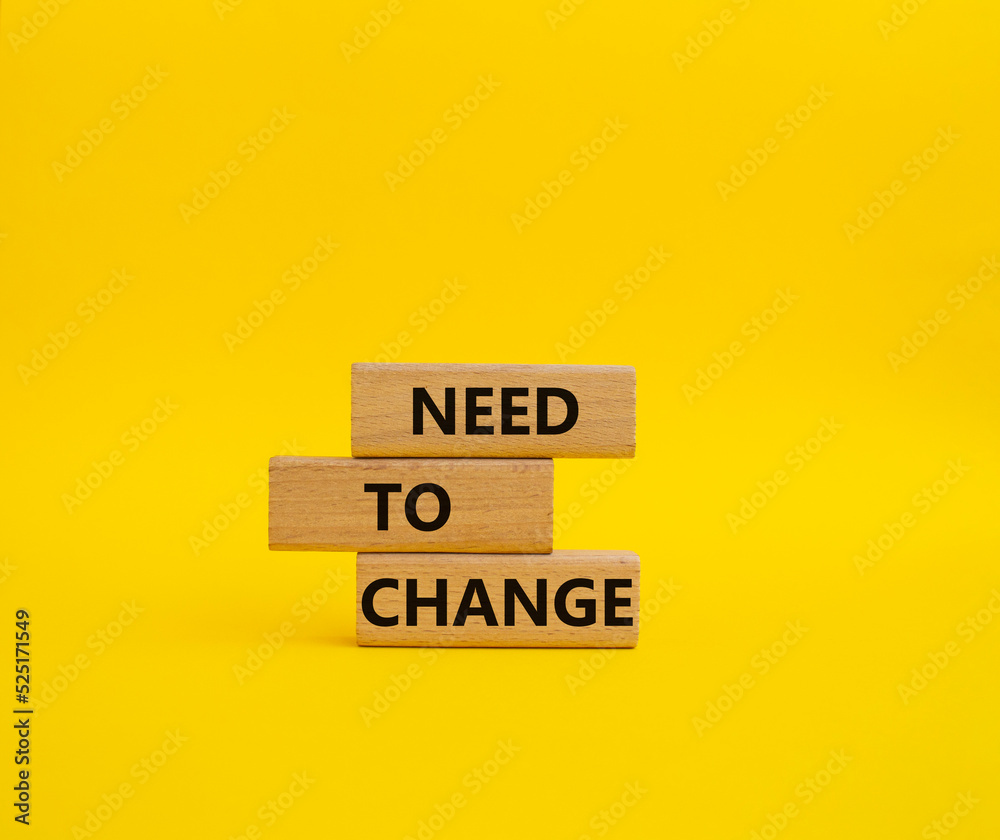 Need to change symbol. Concept words 'Need to change' on wooden blocks. Beautiful yellow background. Business and Need to change concept. Copy space. Need to change symbol. Concept words 'Need to change' on wooden blocks. Beautiful yellow background. Business and Need to change concept. Copy space.