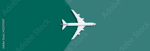 Flat lay design of travel concept with plane on blue background with copy space