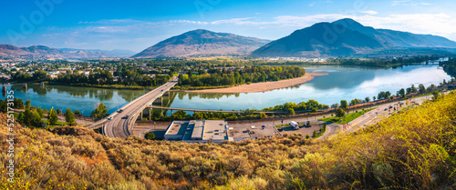 Kamloops cityscape skyline in British Columbia, Canada. Panoramic vista landscape at Strathcona Park with the views of Thompson River and Overlander's Bridge.
