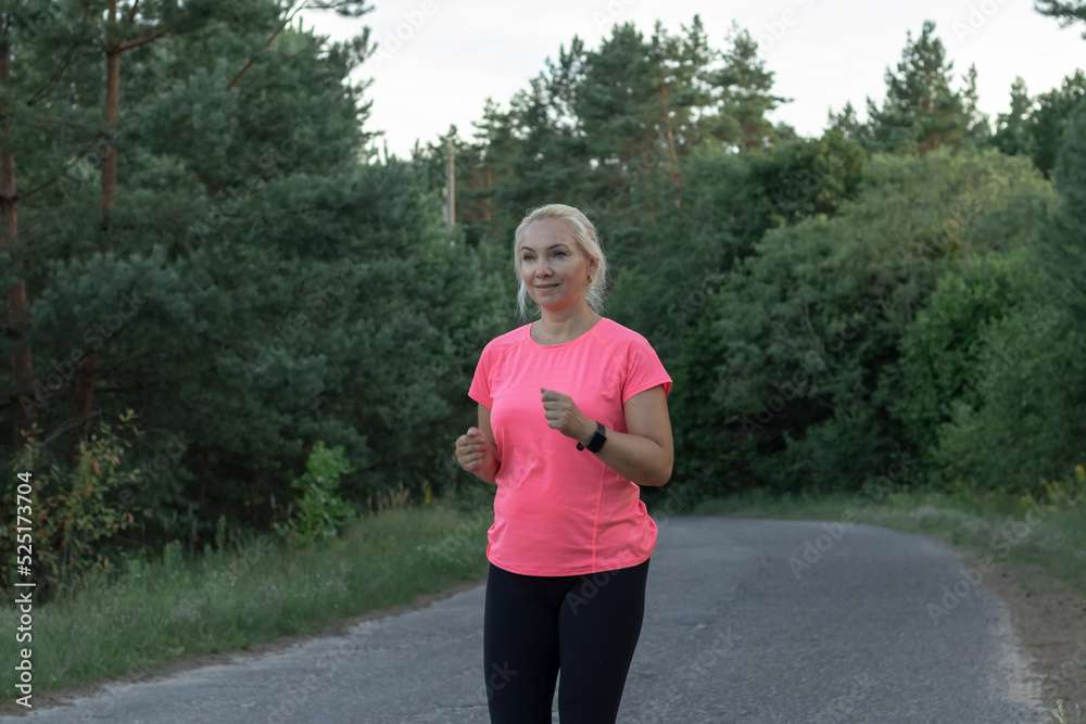 a young girl runs in the woods Doing sports Healthy lifestyle a young girl runs in the woods Doing sports Healthy lifestyle