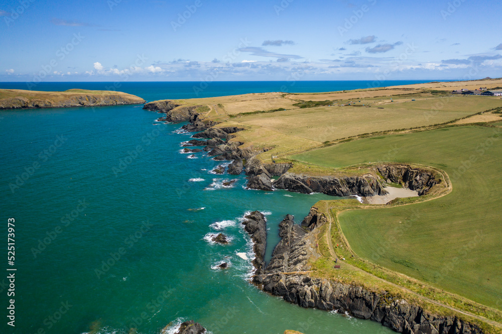 Low altitude aerial view of the rugged Welsh coastline in Pembrokeshire (Gwbert) Low altitude aerial view of the rugged Welsh coastline in Pembrokeshire (Gwbert)