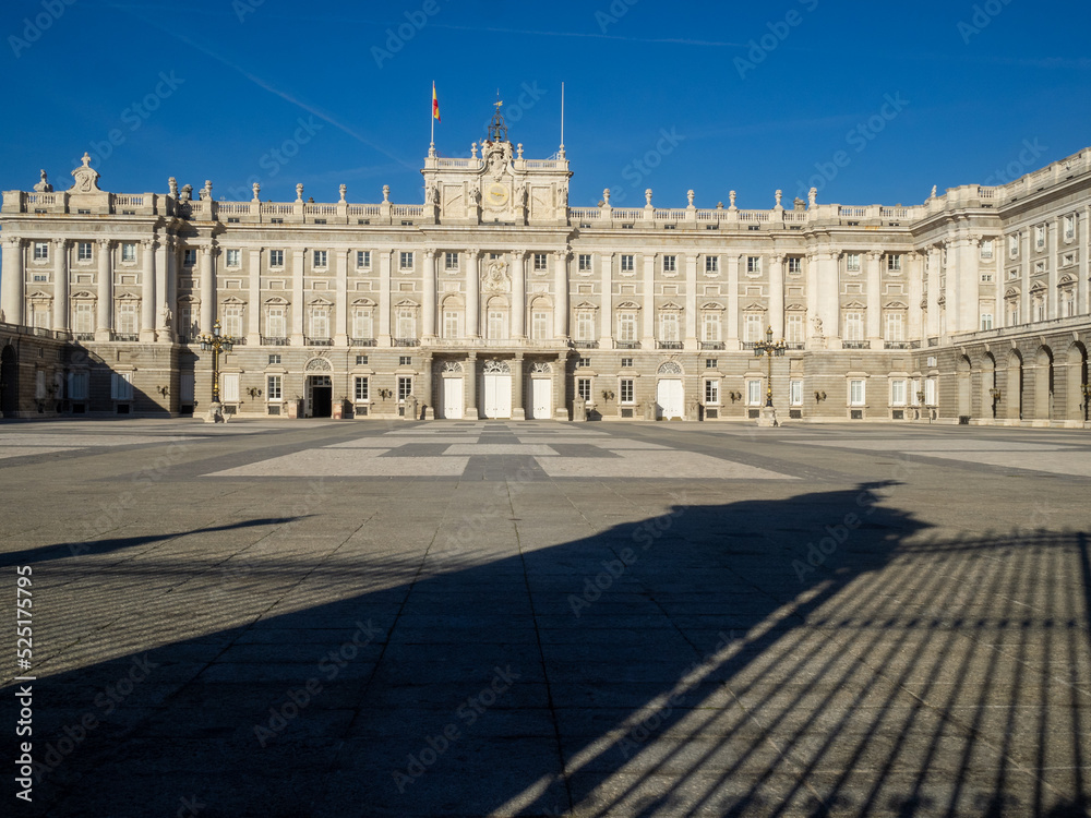 Madrid Royal Palace Plaza de la Armeria with gate shadow projected on the ground