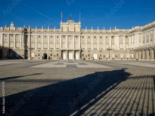 Madrid Royal Palace Plaza de la Armeria with gate shadow projected on the ground