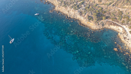 Drone aerial seascape with  yacht moored in the coast. Summer vacations in the sea. Ayia Napa Cyprus © Michalis Palis