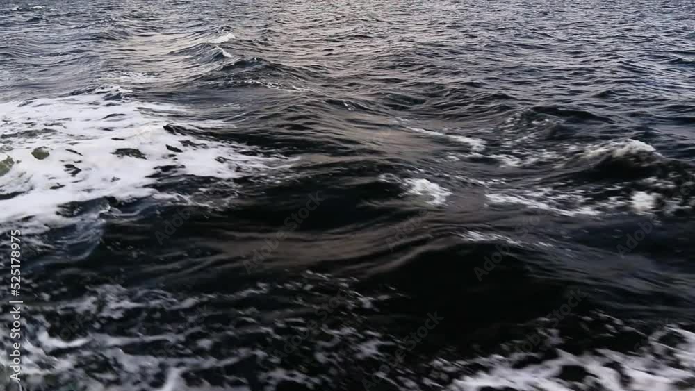water trail behind the ship. trail behind the stern of the ferry in the white sea water trail behind the ship. trail behind the stern of the ferry in the white sea