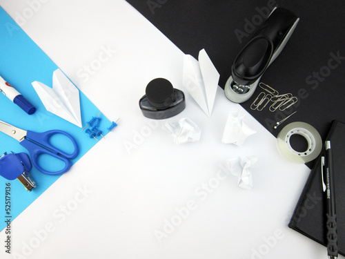       Creative trendy minimalist school or office workspace with blue and black materials on a white background.      photo