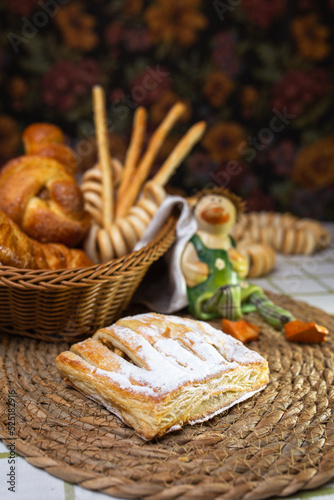 homemade pastry puff pastry with apple filling on the table