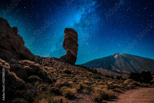 roques de Garcia stone and the milky way Teide mountain volcano in the Teide National Park Tenerife Canary Islands Spain.